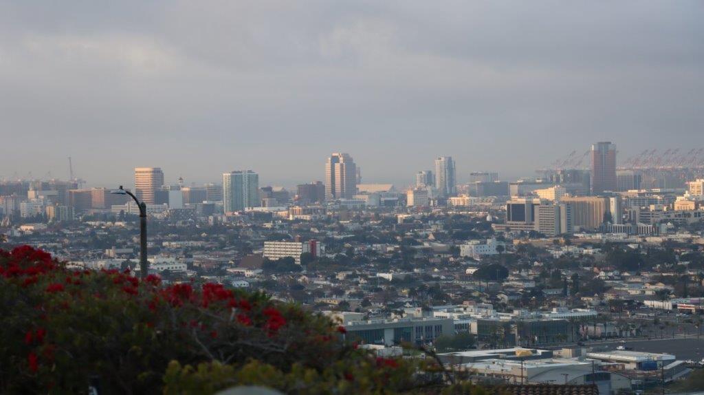 A cityscape with a cloudy sky

AI-generated content may be incorrect.