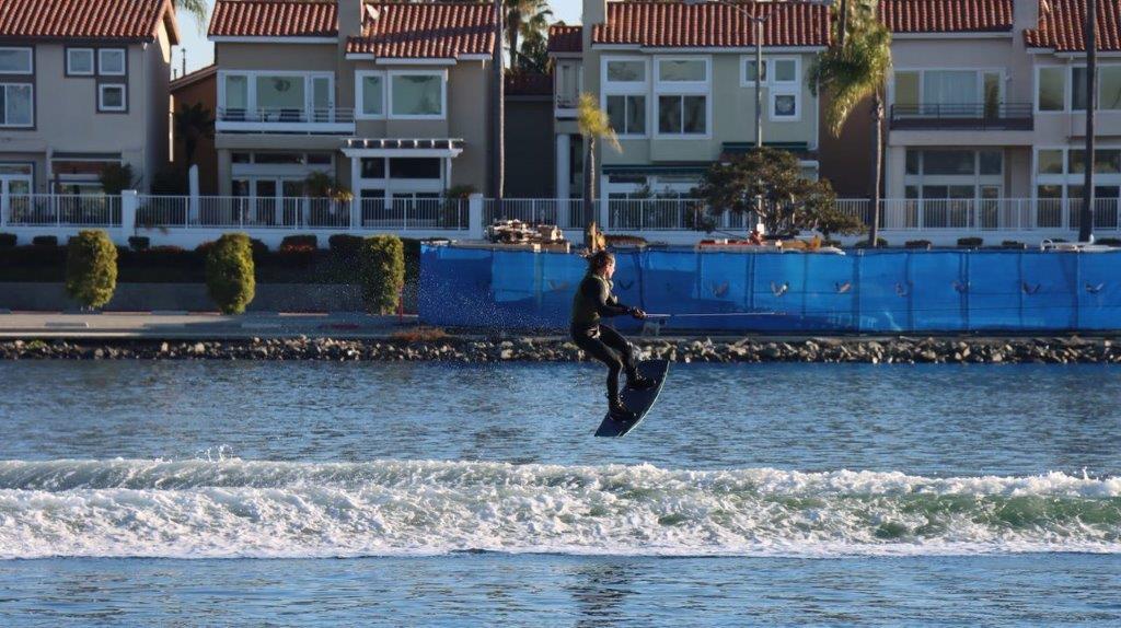 A person on a wakeboard

Description automatically generated