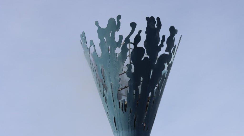 A metal sculpture with a design

AI-generated content may be incorrect.