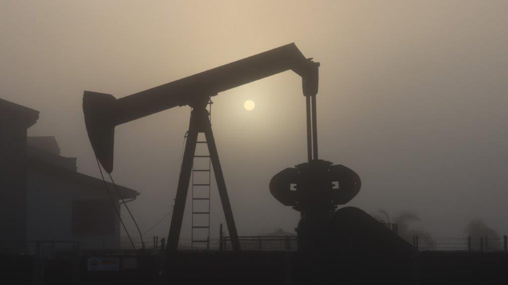 A silhouette of a oil rig

AI-generated content may be incorrect.