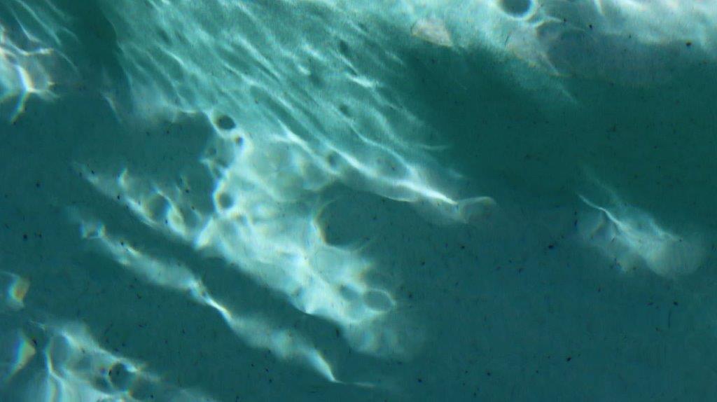 A close-up of a blue surface

Description automatically generated