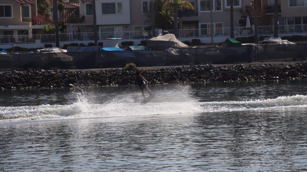 A person on a wakeboard in the water

Description automatically generated