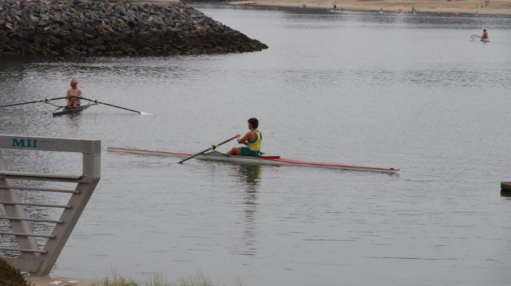 A person rowing a boat

Description automatically generated