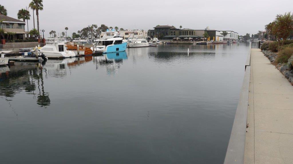 A body of water with boats in it

Description automatically generated