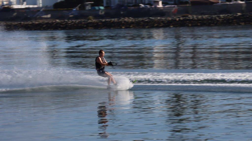 A person on a water ski

Description automatically generated