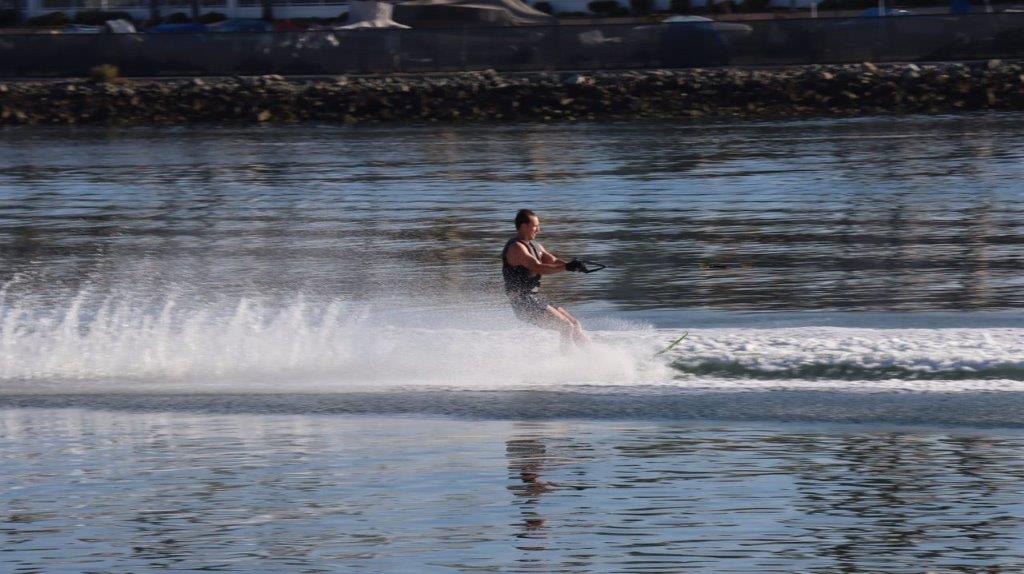 A person on a water ski

Description automatically generated