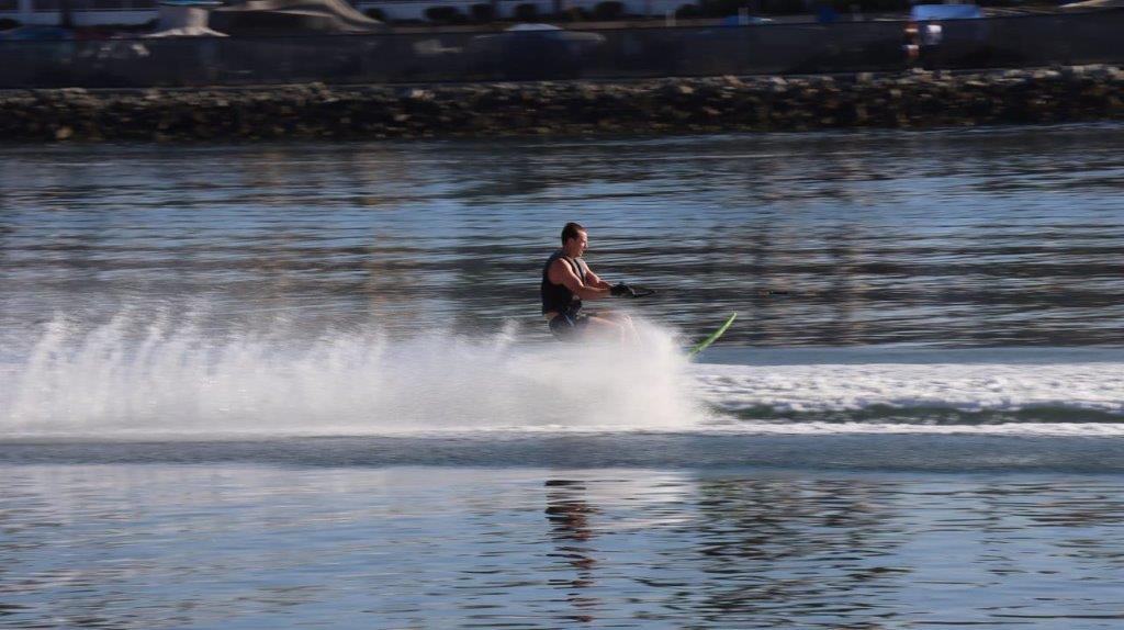 A person on a water ski

Description automatically generated