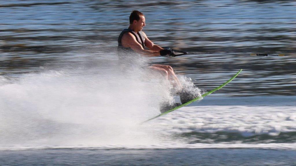 A person on a water ski

Description automatically generated