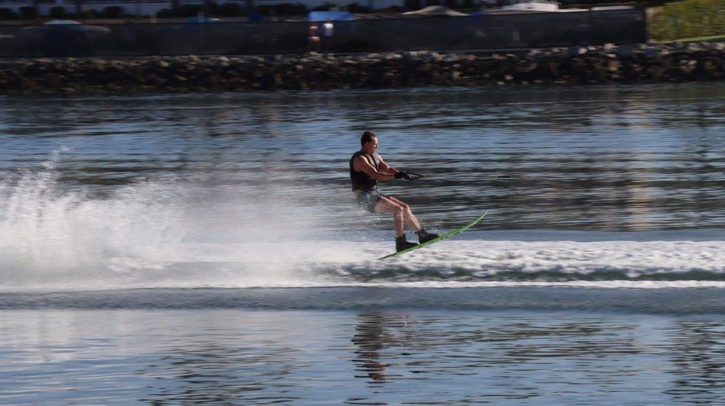 A person on a water ski

Description automatically generated