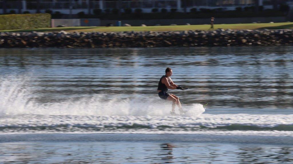 A person on a water ski

Description automatically generated