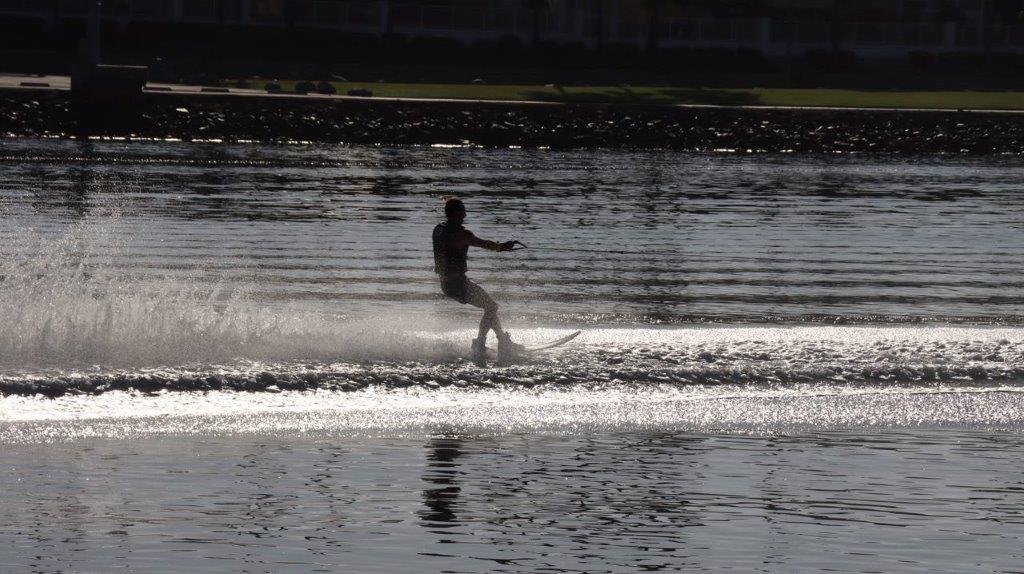 A person water skiing on the water

Description automatically generated