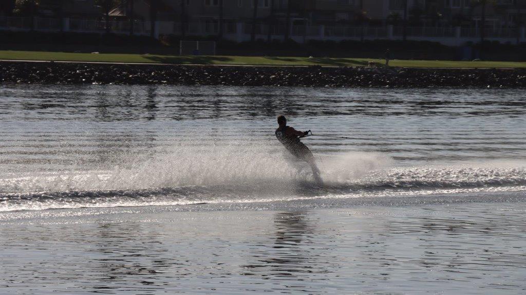 A person water skiing on the water

Description automatically generated