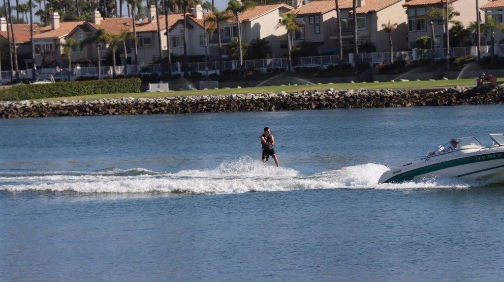 A person on a wakeboard in the water

Description automatically generated