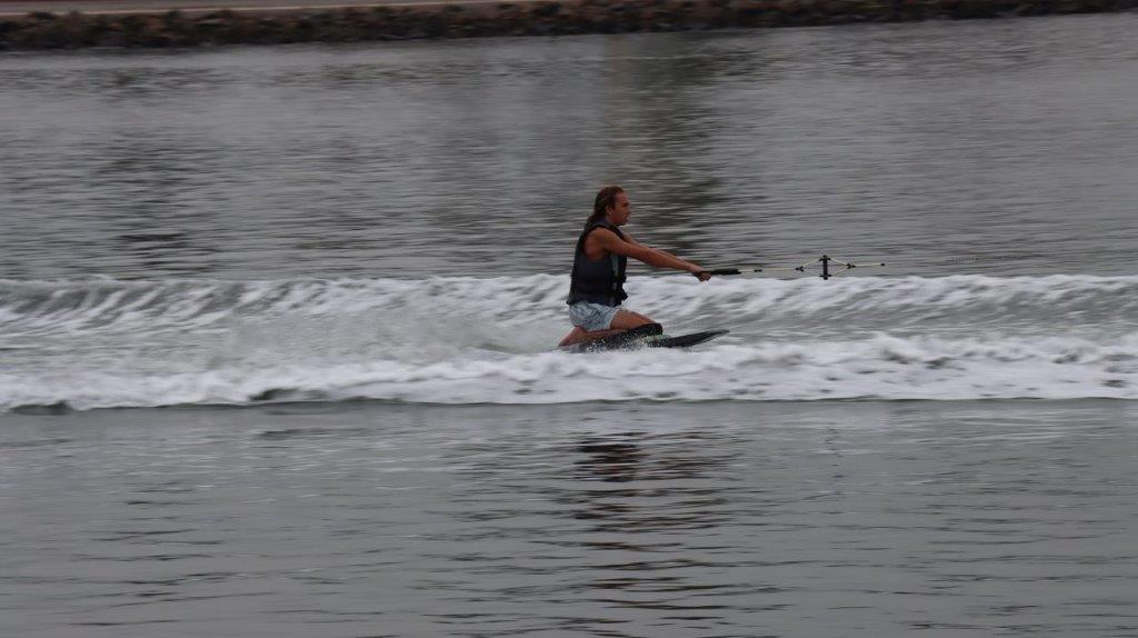 A person on a water ski

Description automatically generated