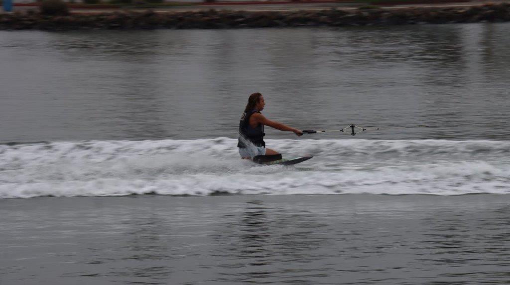 A person on a water ski

Description automatically generated