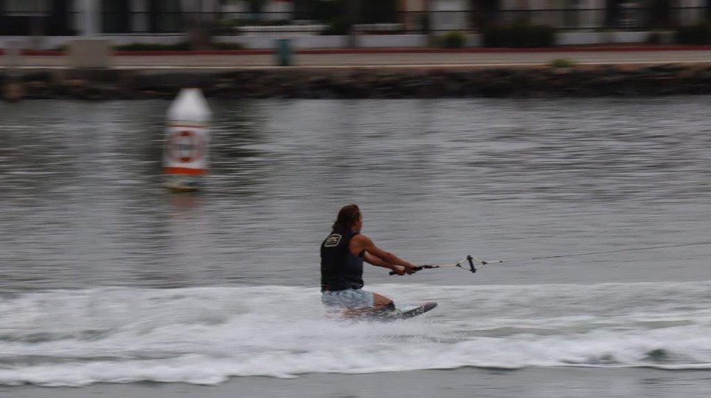 A person on a water ski

Description automatically generated