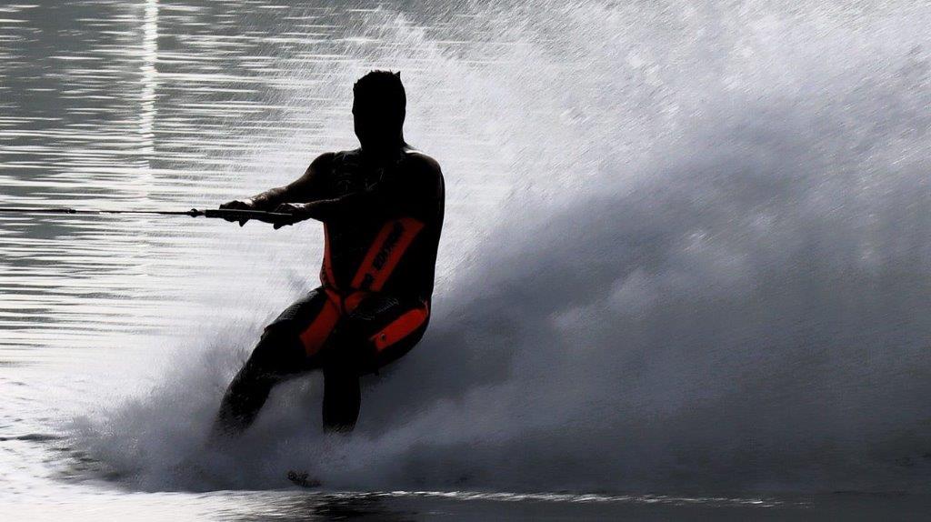 A person riding a jet ski

Description automatically generated