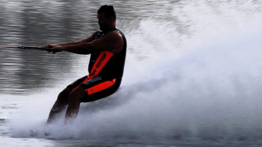 A person on a water ski

Description automatically generated