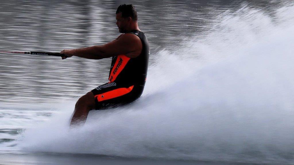 A person on a water ski

Description automatically generated