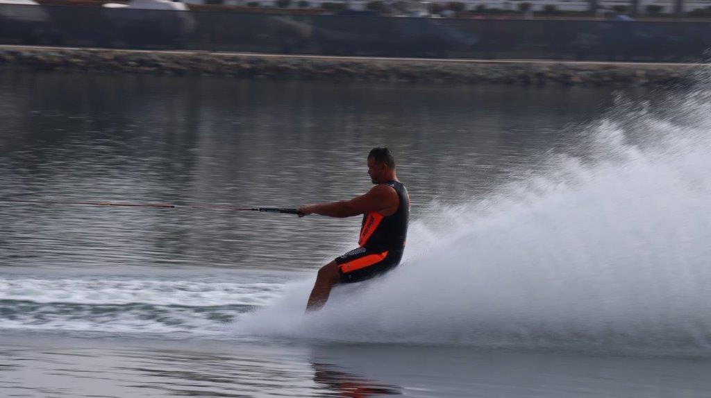 A person on a water ski

Description automatically generated