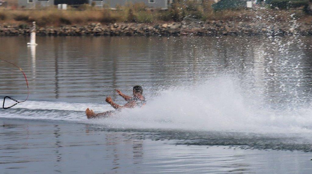 A person on a water ski

Description automatically generated