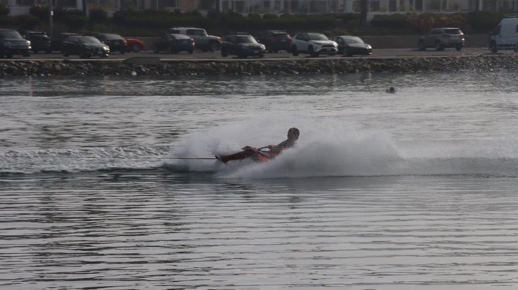 A person on a water ski

Description automatically generated