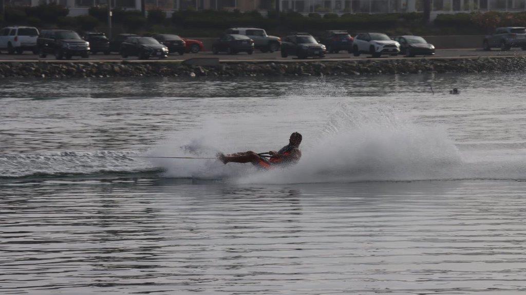 A person on a water ski

Description automatically generated